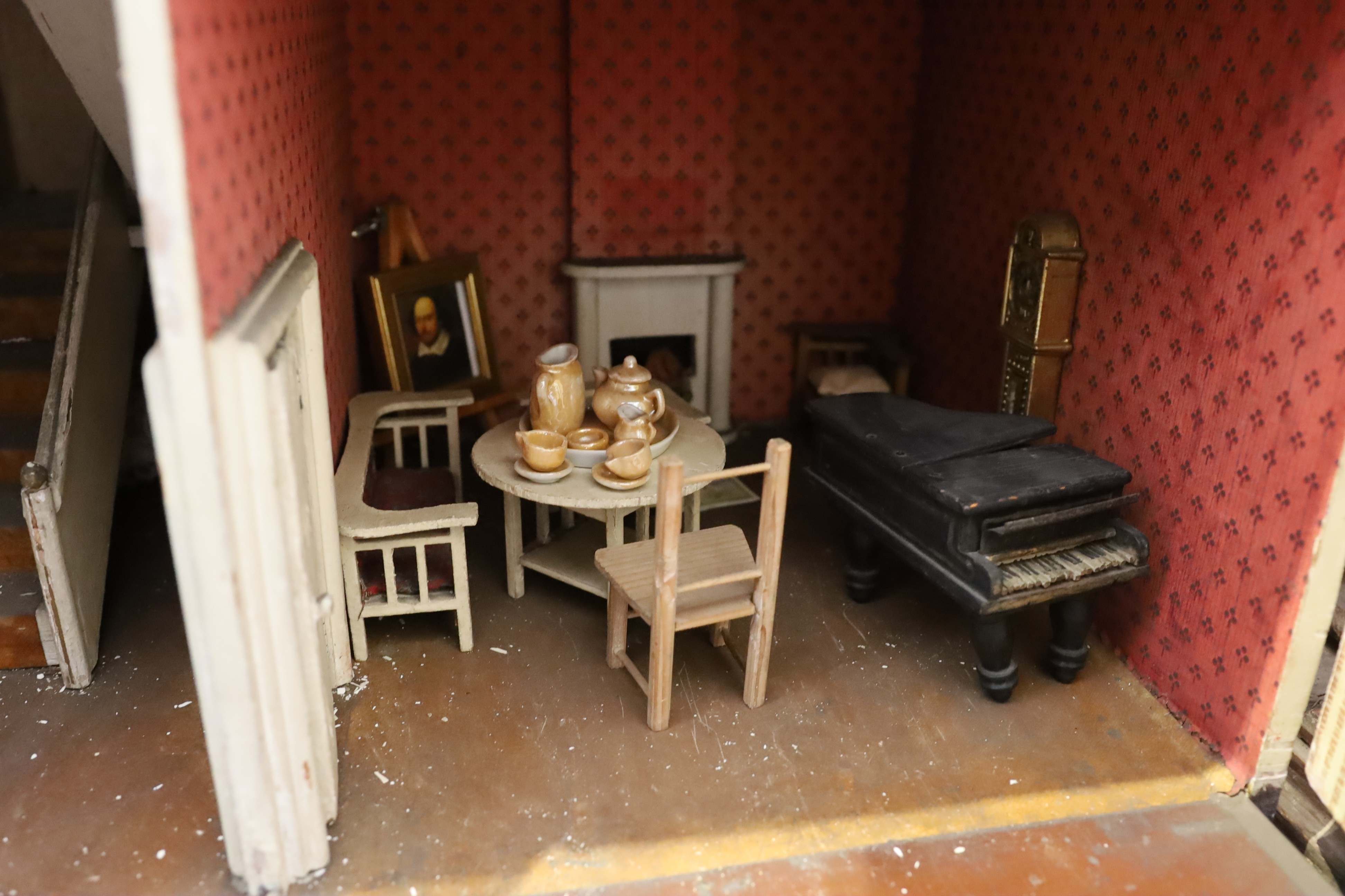 A G. and J. Lines furnished dolls’ house of 'Kits Koty' type, early 20th century, 92cm high.